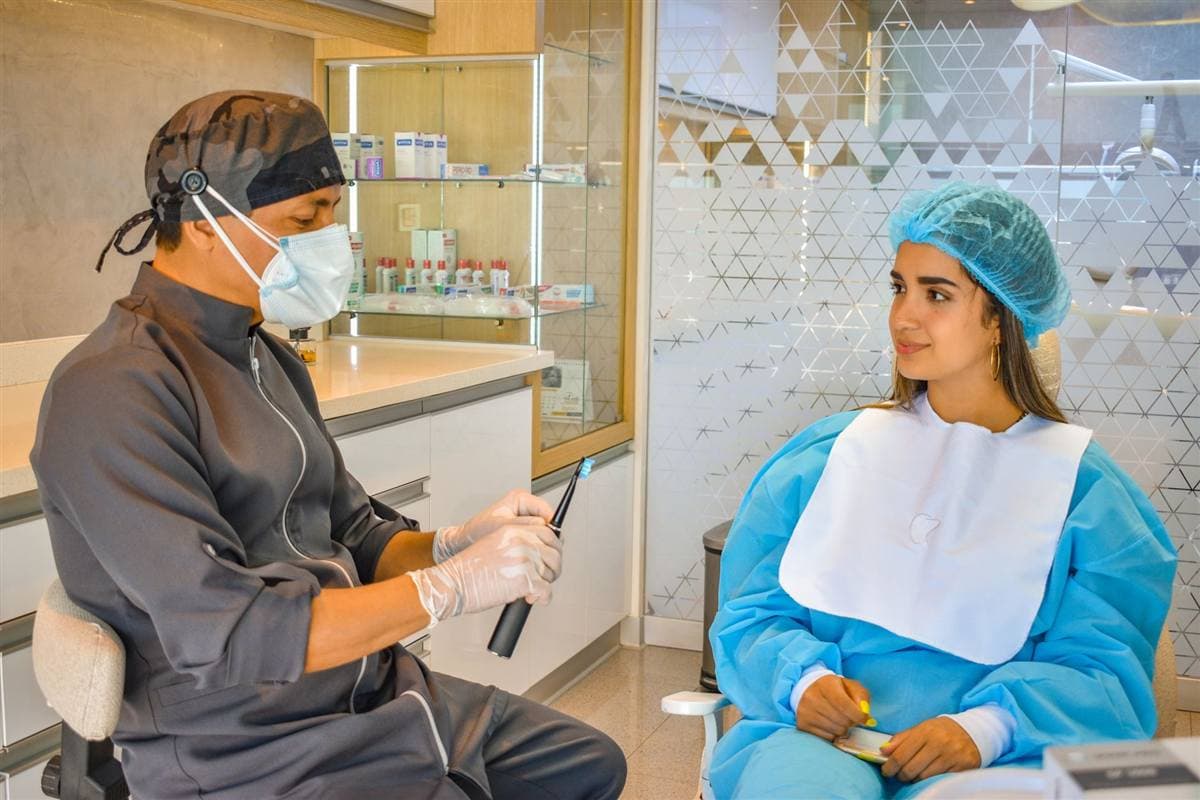 root canal vs extraction Kharghar dentist consulting patient at Reform Dental Clinic Sector 15