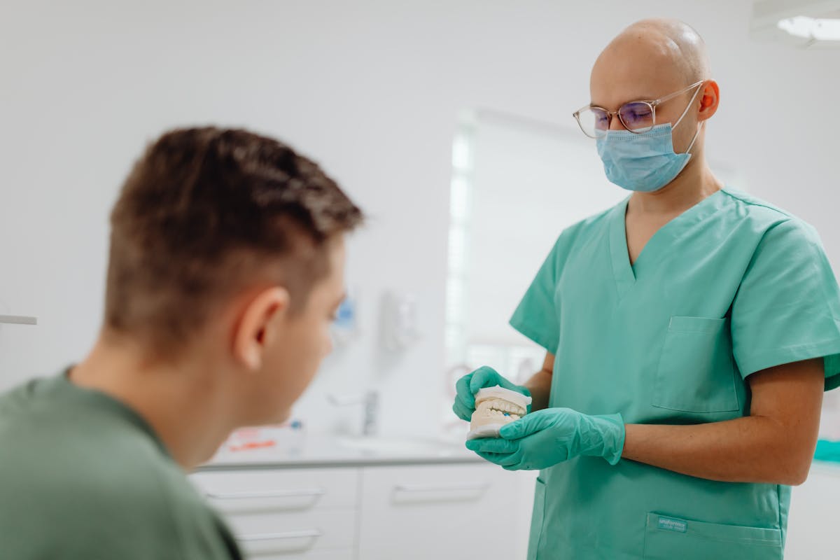 Root canal treatment Kharghar — dentist explaining the procedure to a patient at Reform Dental Clinic Sector 15